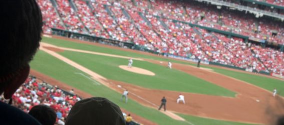 A full baseball stadium during a baseball game